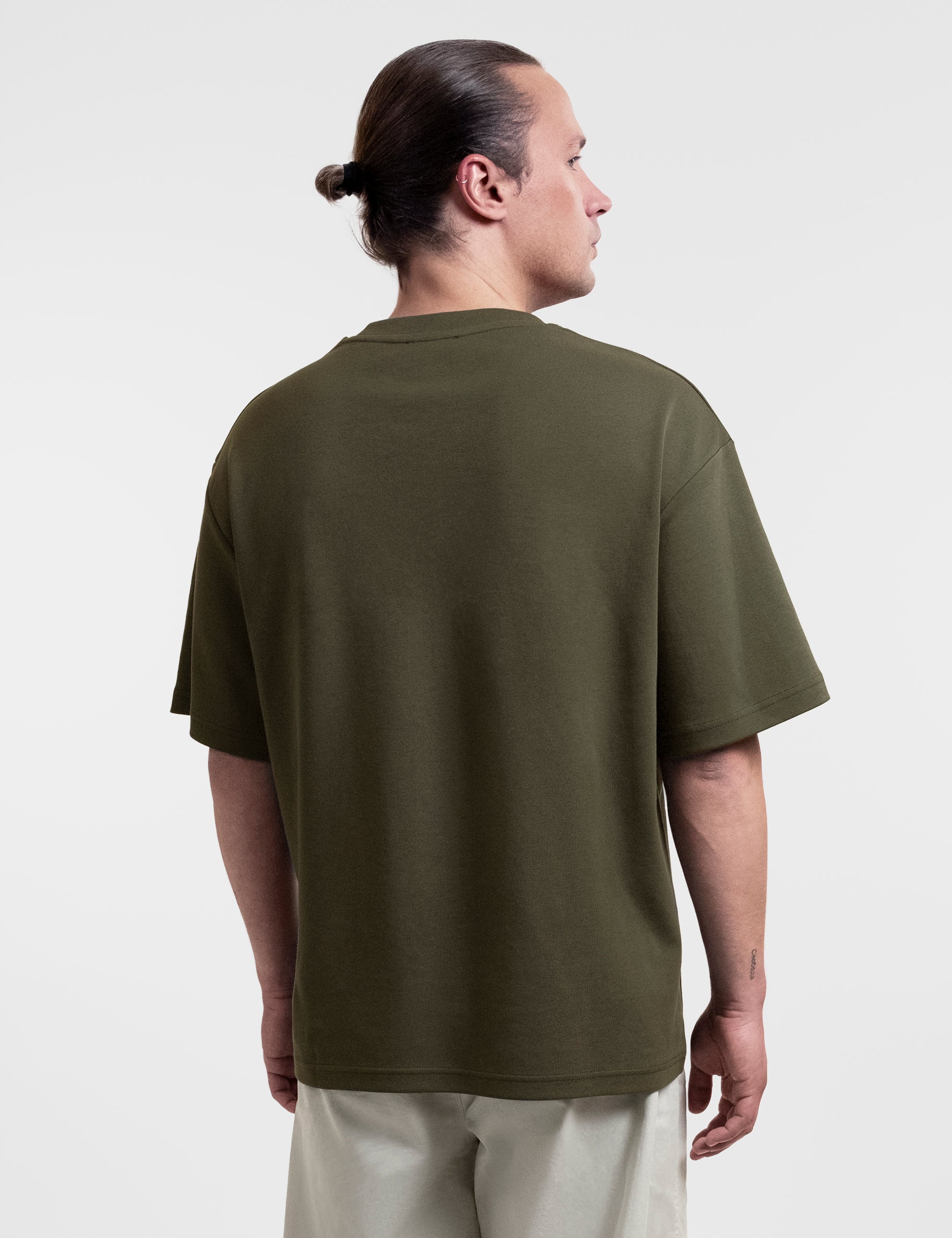 Open Row Men's Open Heart Tee in khaki green, back view.