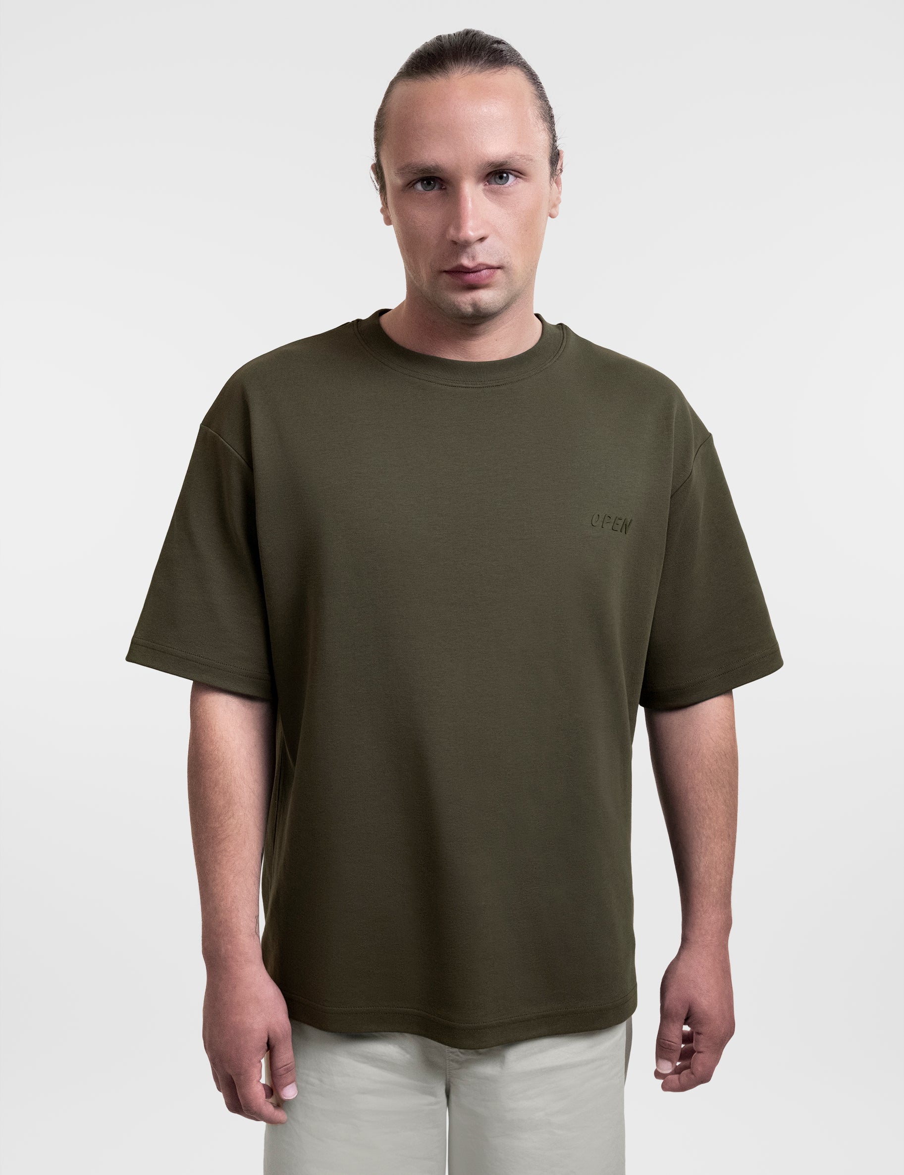 Open Row Men's Open Heart Tee in khaki green, front view.