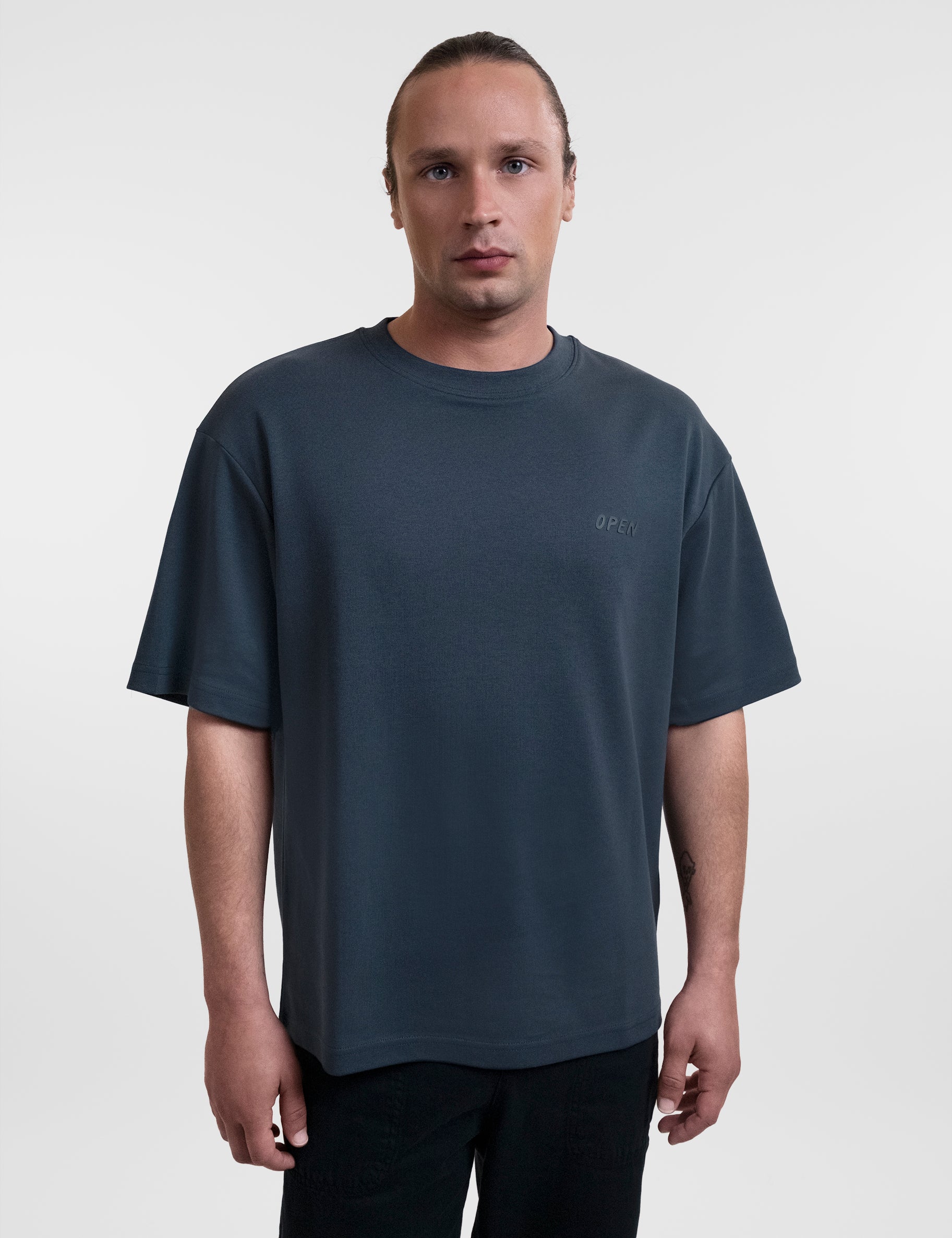 Open Row Men's Open Heart Tee in navy blue, front view.