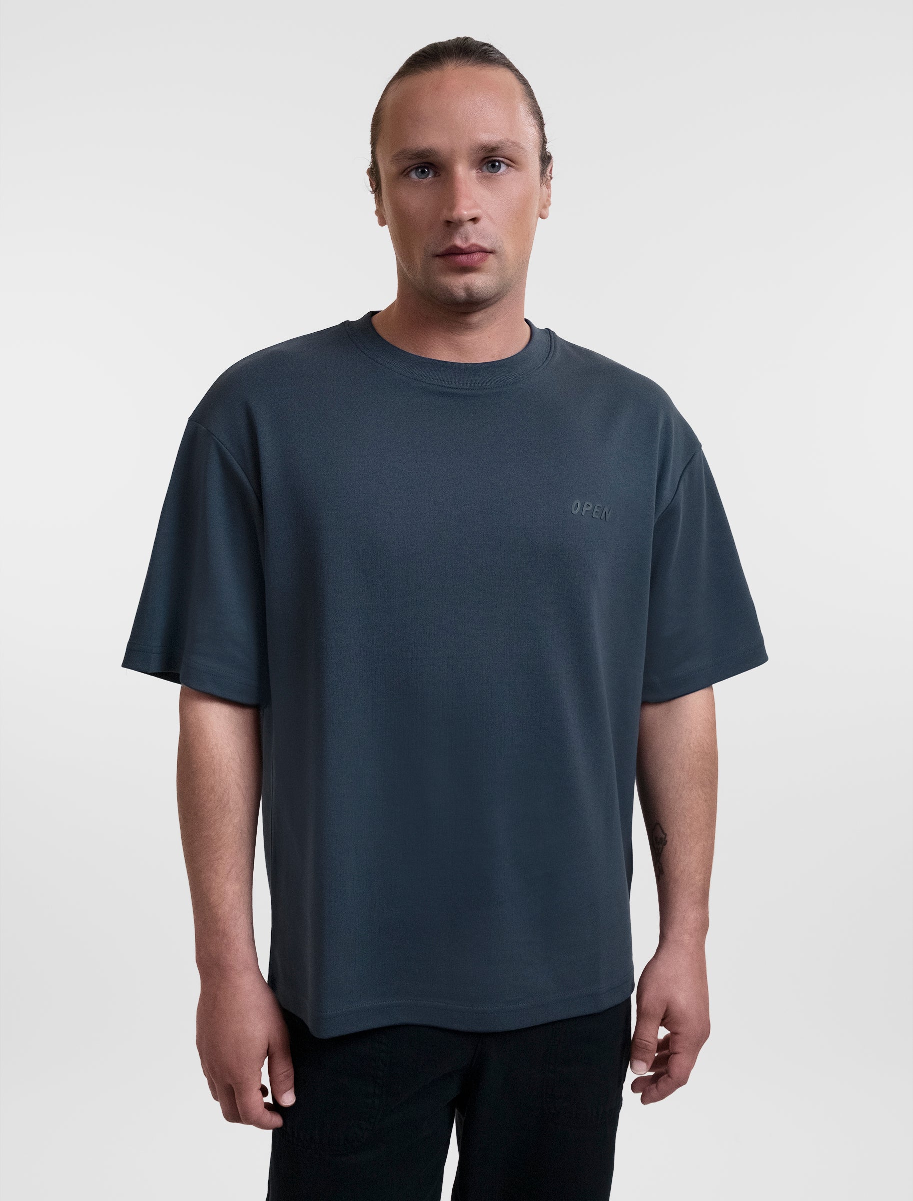 Open Row Men's Open Heart Tee in navy blue, front view.