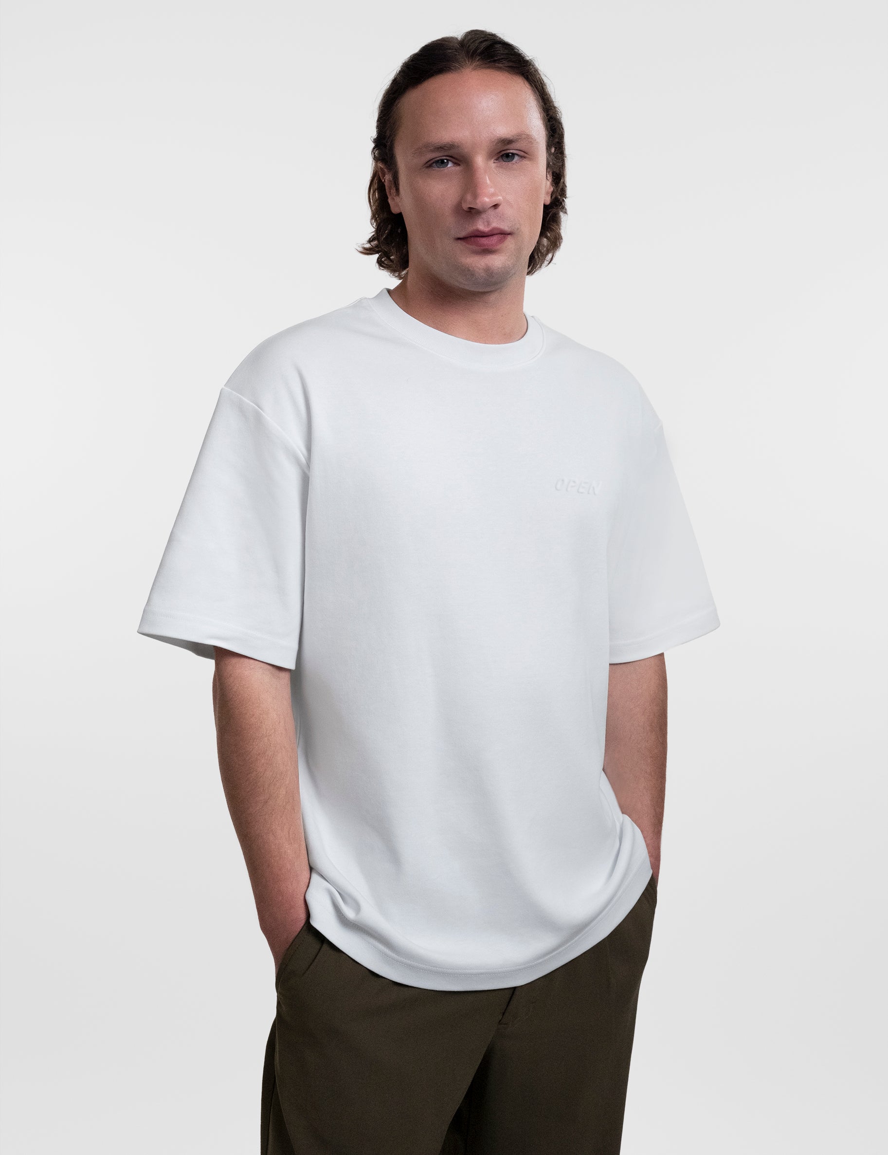 Open Row Men's Open Heart Tee in white, front view.