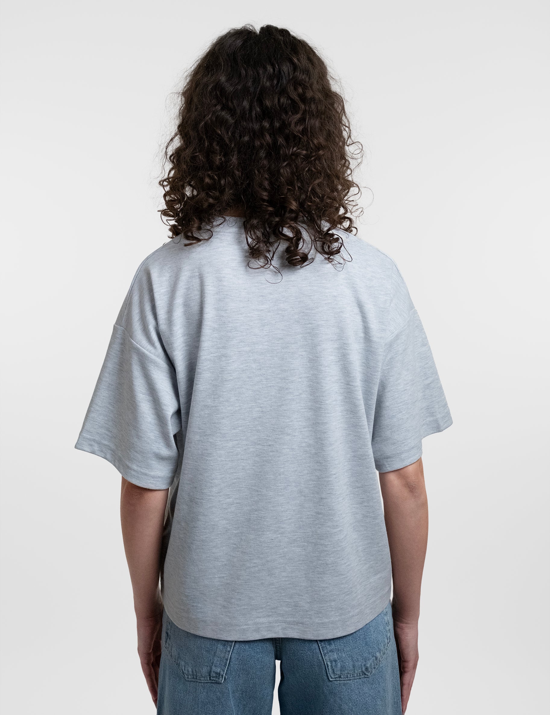 Open Row Women's Open Heart Tee in grey, back view.