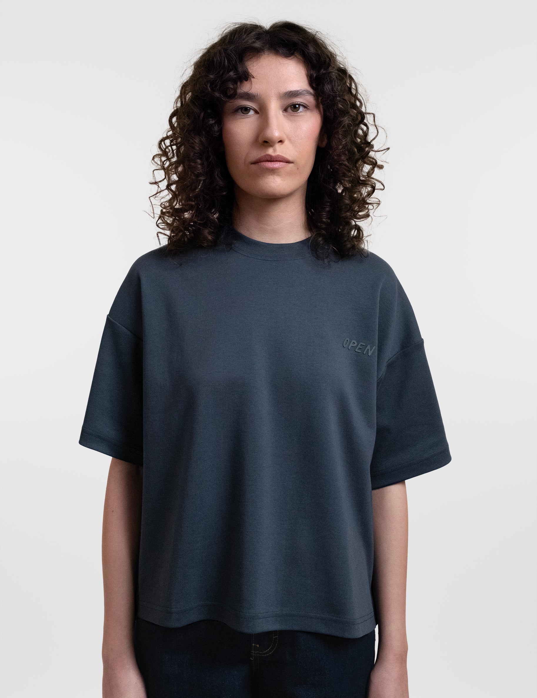 Open Row Women's Open Heart Tee in navy blue, front view.