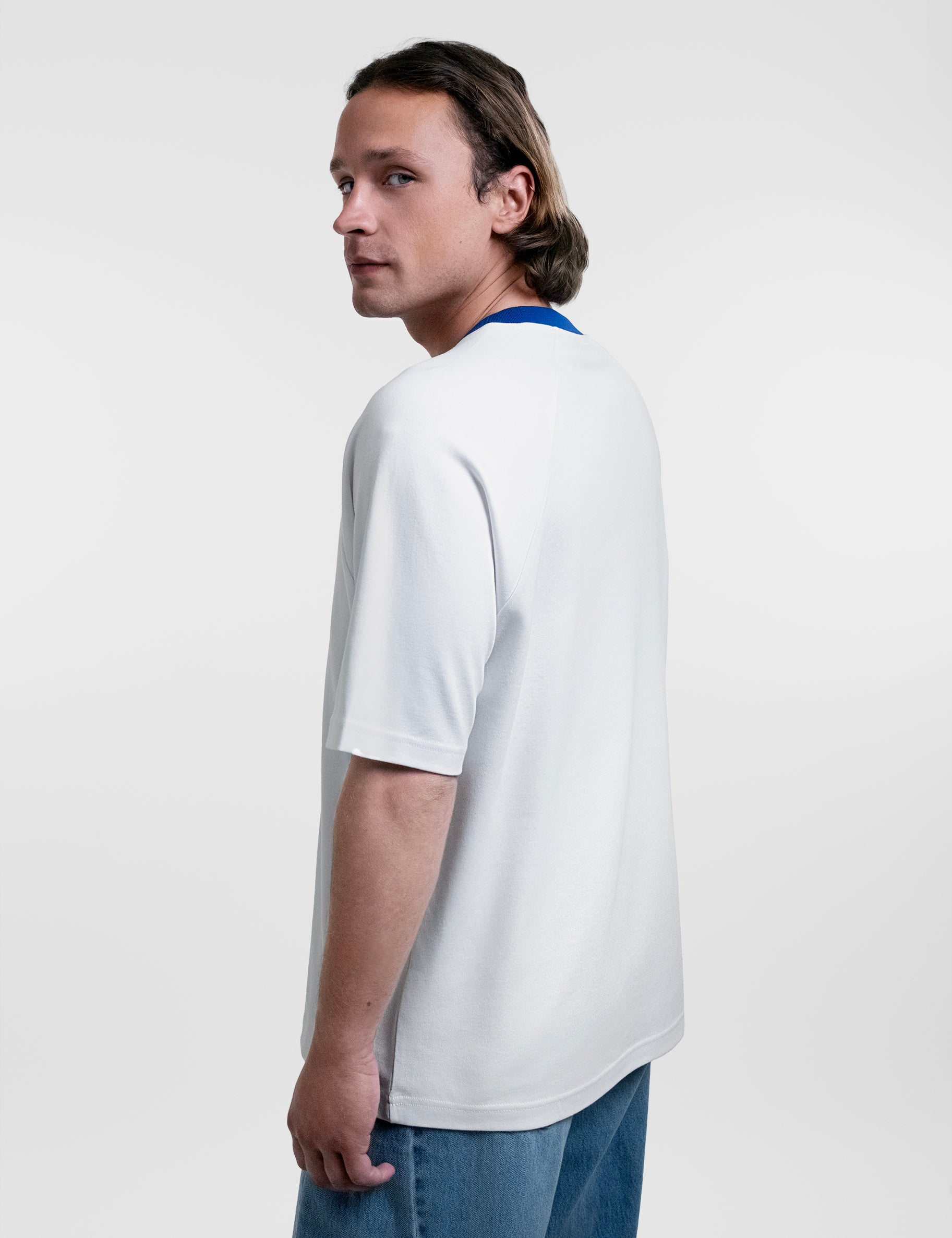 Open Row Men's Runaway Tee in white with blue collar, side view