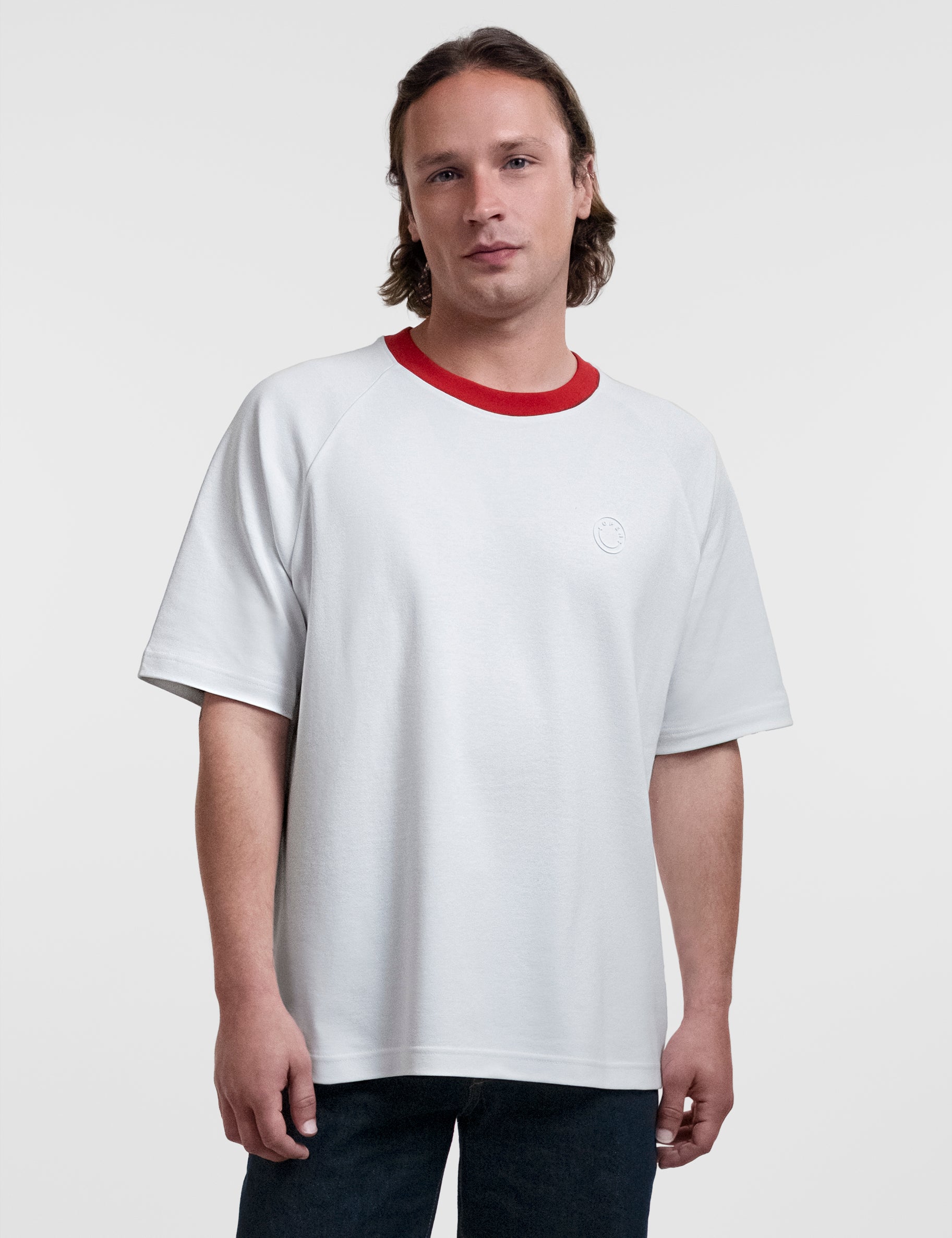 Open Row Men's Runaway Tee in white with red collar, front view.