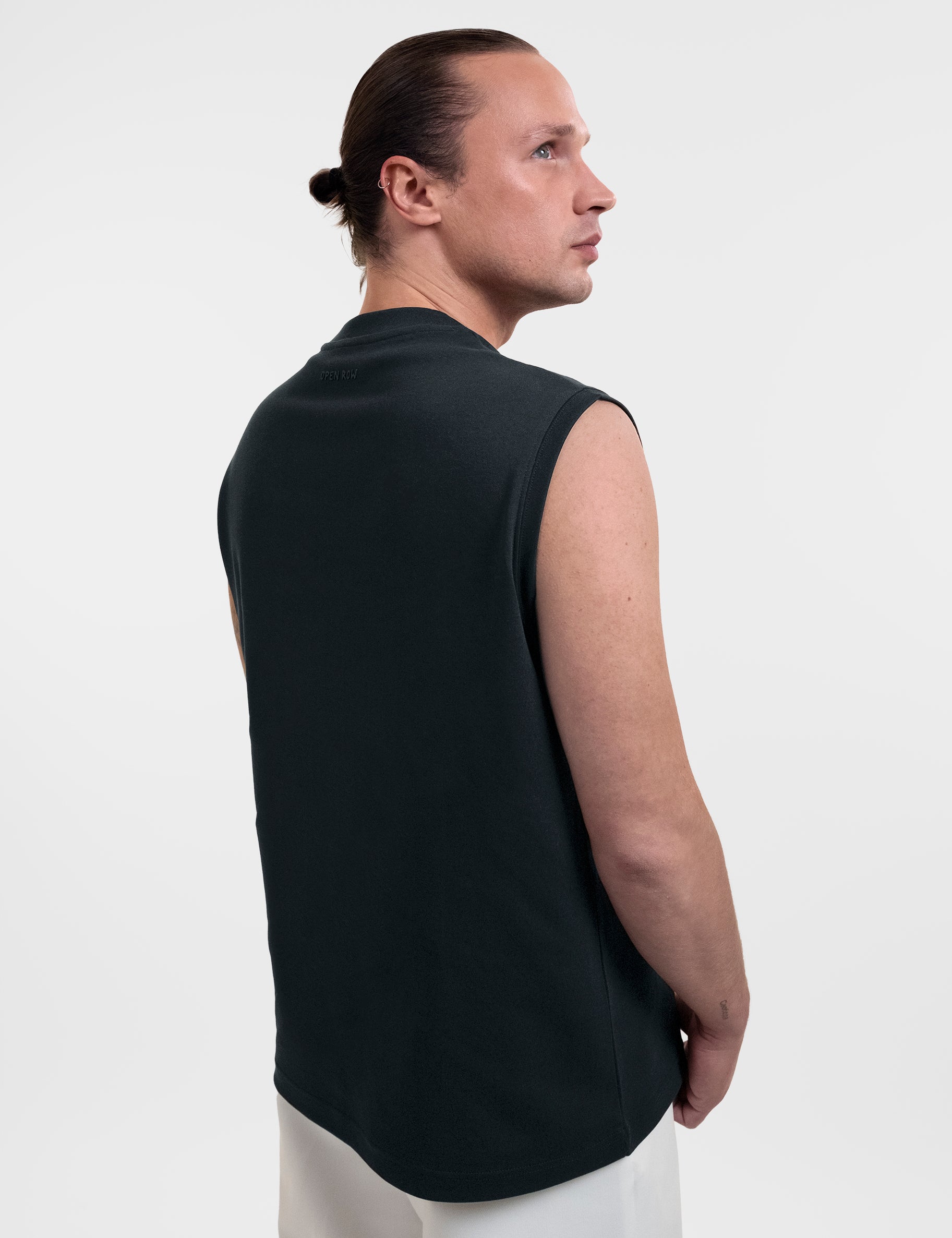 Open Row Men's Tank Tee in black, three-quarter back view.