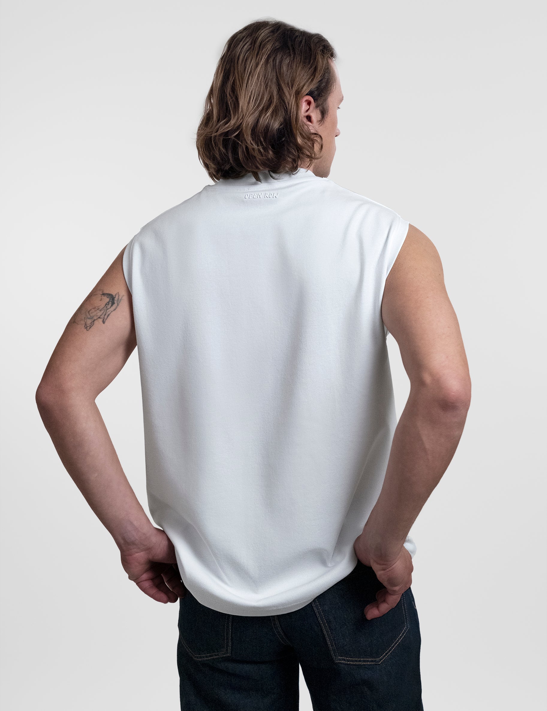 Open Row Men's Tank Tee in white, back view.