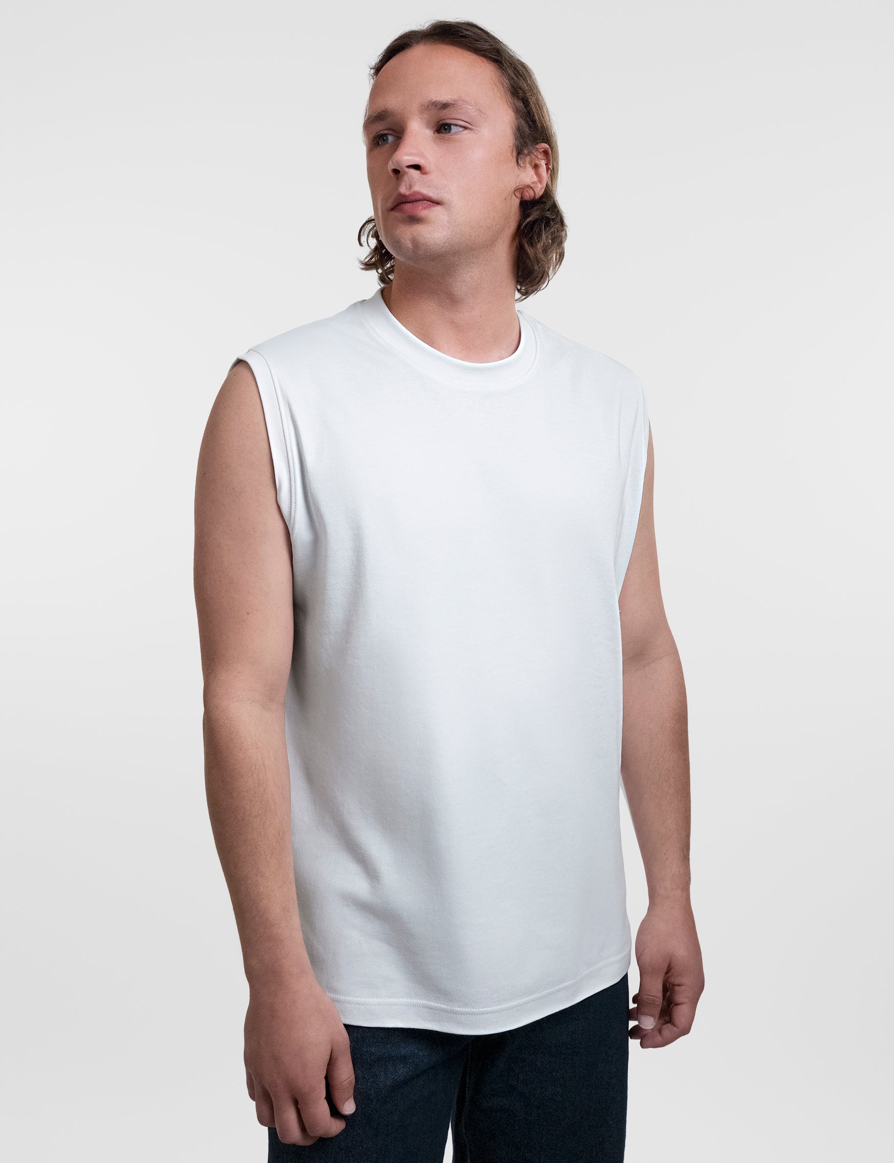 Open Row Men's Tank Tee in white, three-quarter front view.