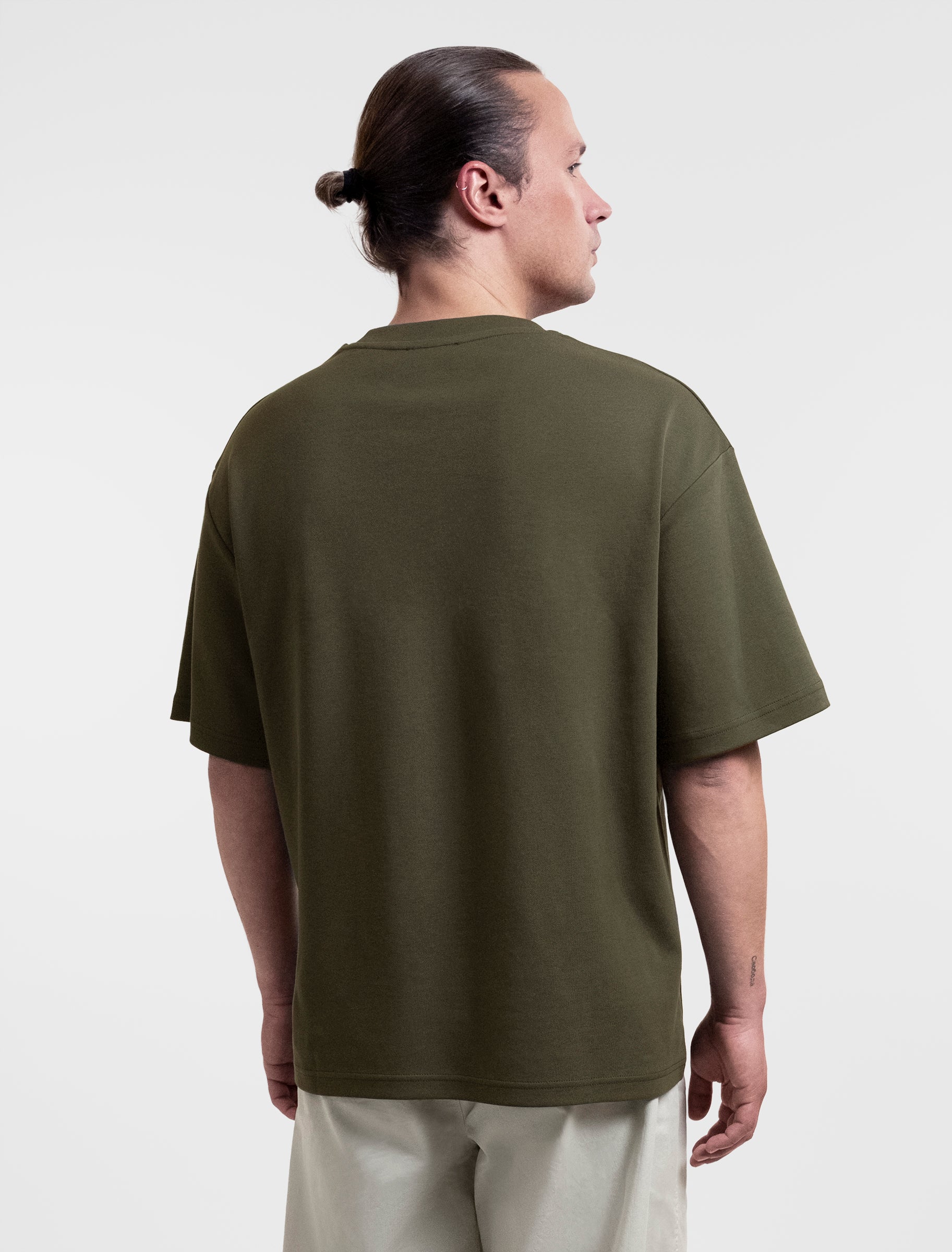 Open Row Men's Open Heart Tee in khaki green, back view.
