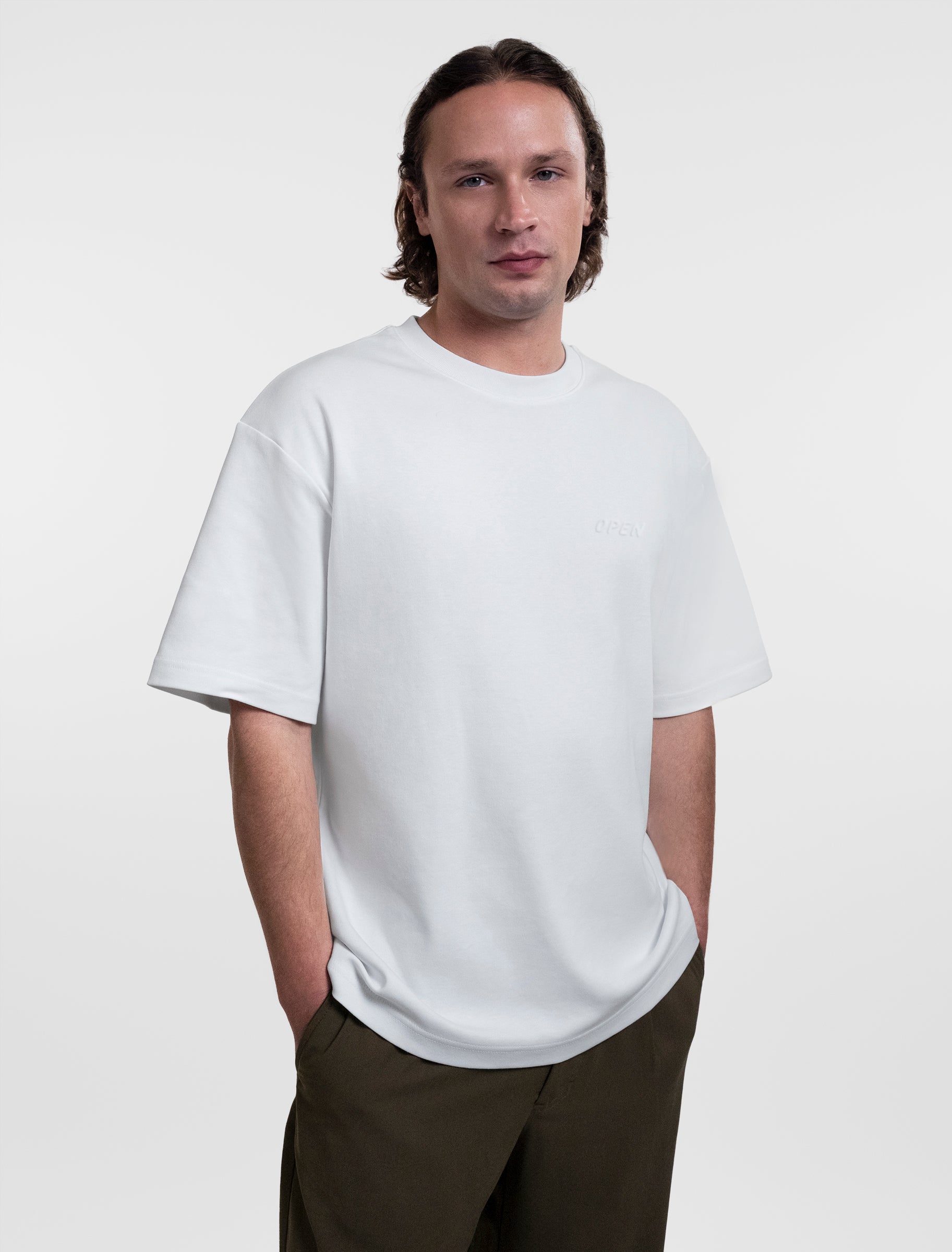 Open Row Men's Open Heart Tee in white, front view.