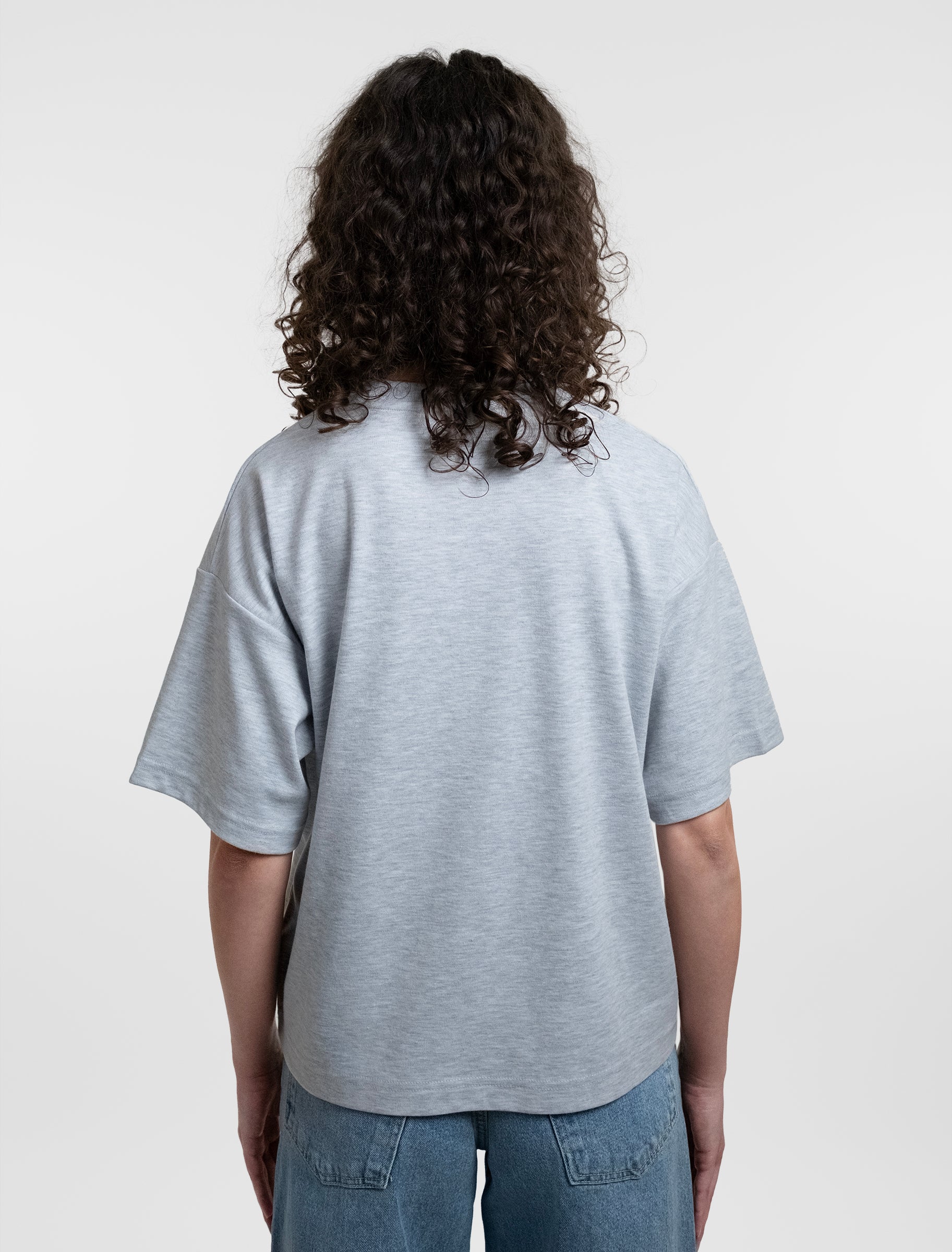 Open Row Women's Open Heart Tee in grey, back view.