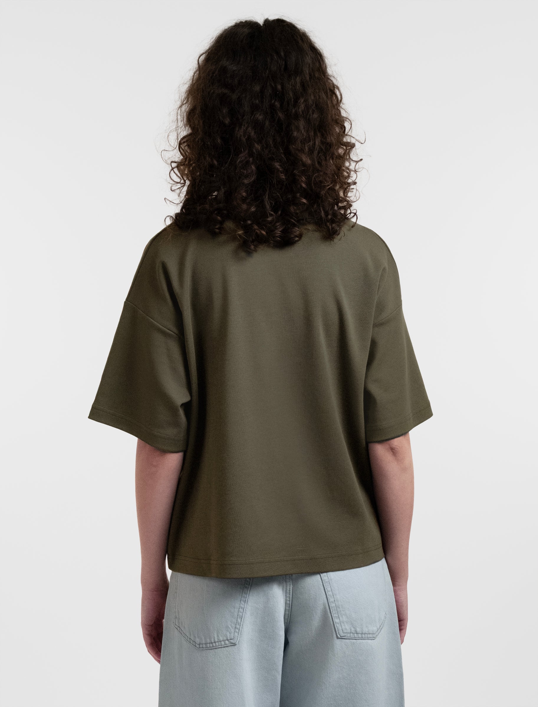 Open Row Women's Open Heart Tee in khaki green, back view.