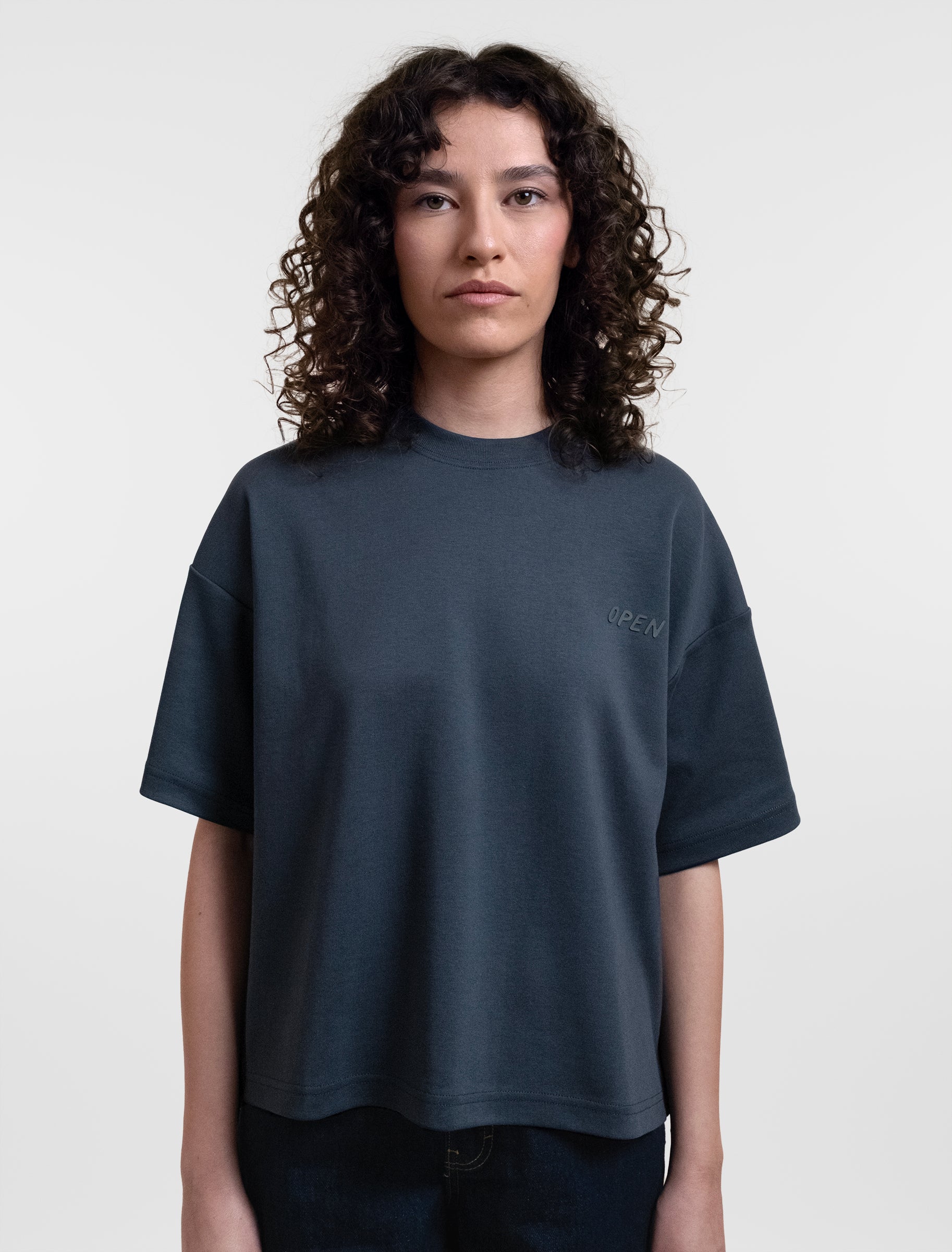 Open Row Women's Open Heart Tee in navy blue, front view.