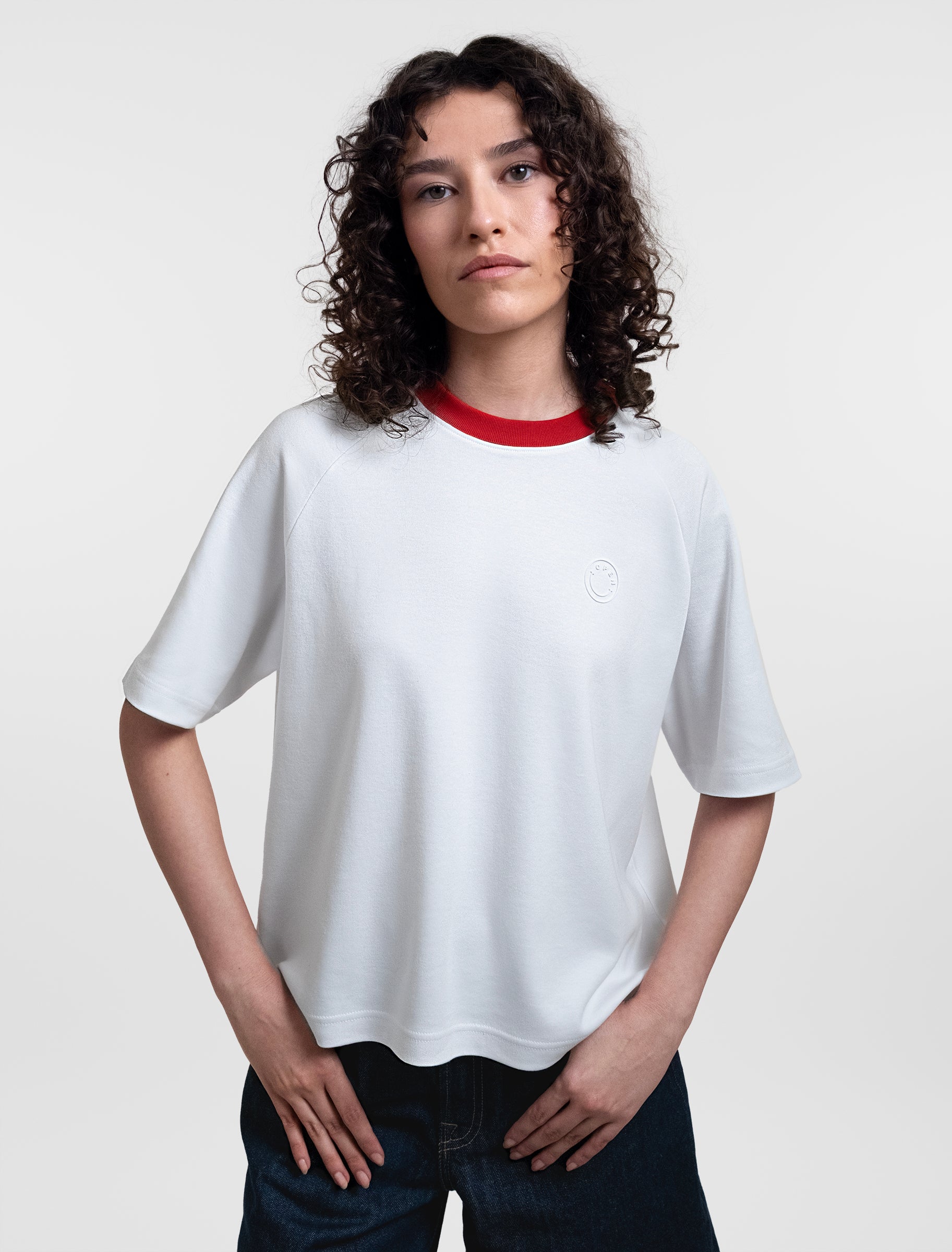 Open Row Women's Runaway Tee in white with red collar, front view.