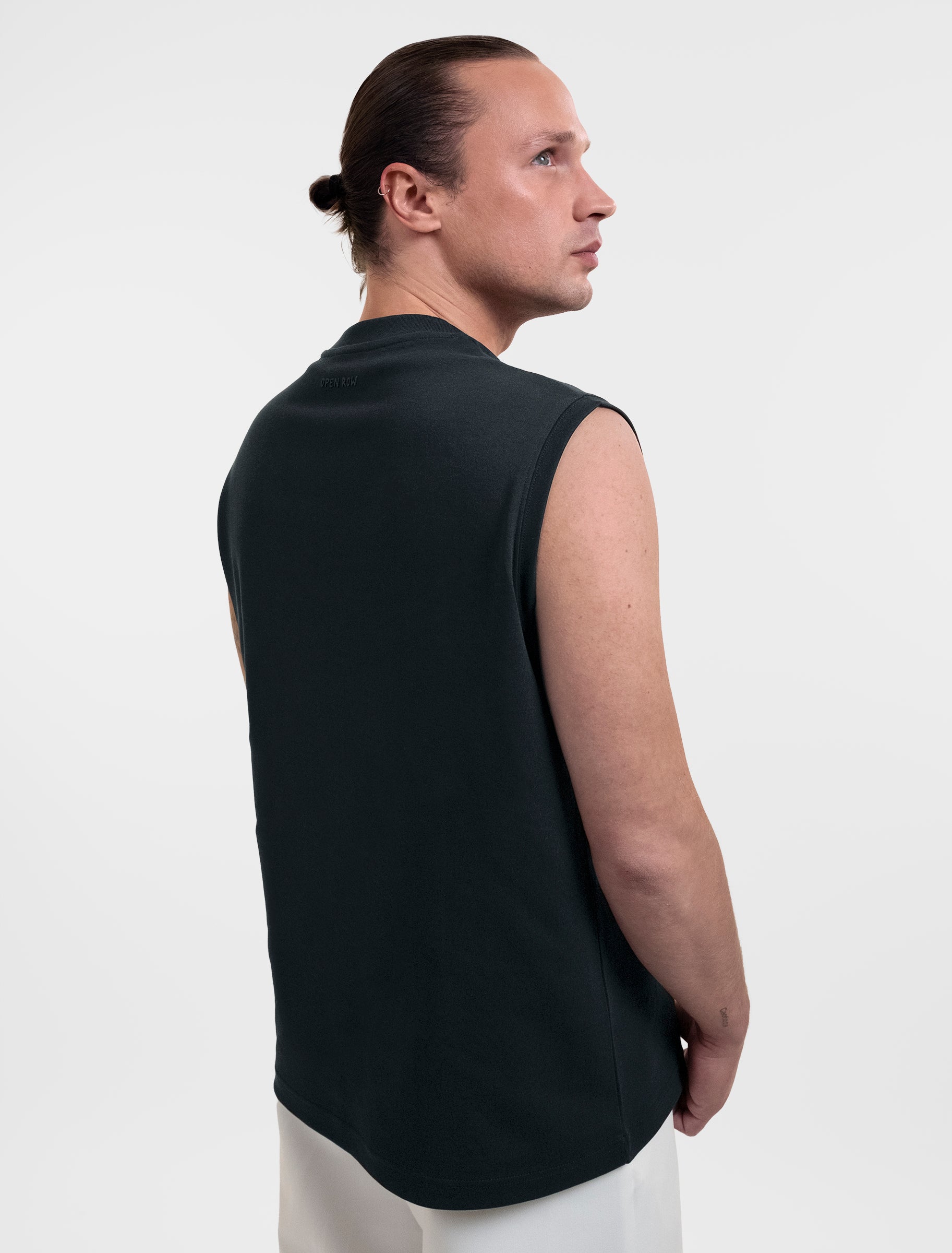 Open Row Men's Tank Tee in black, three-quarter back view.