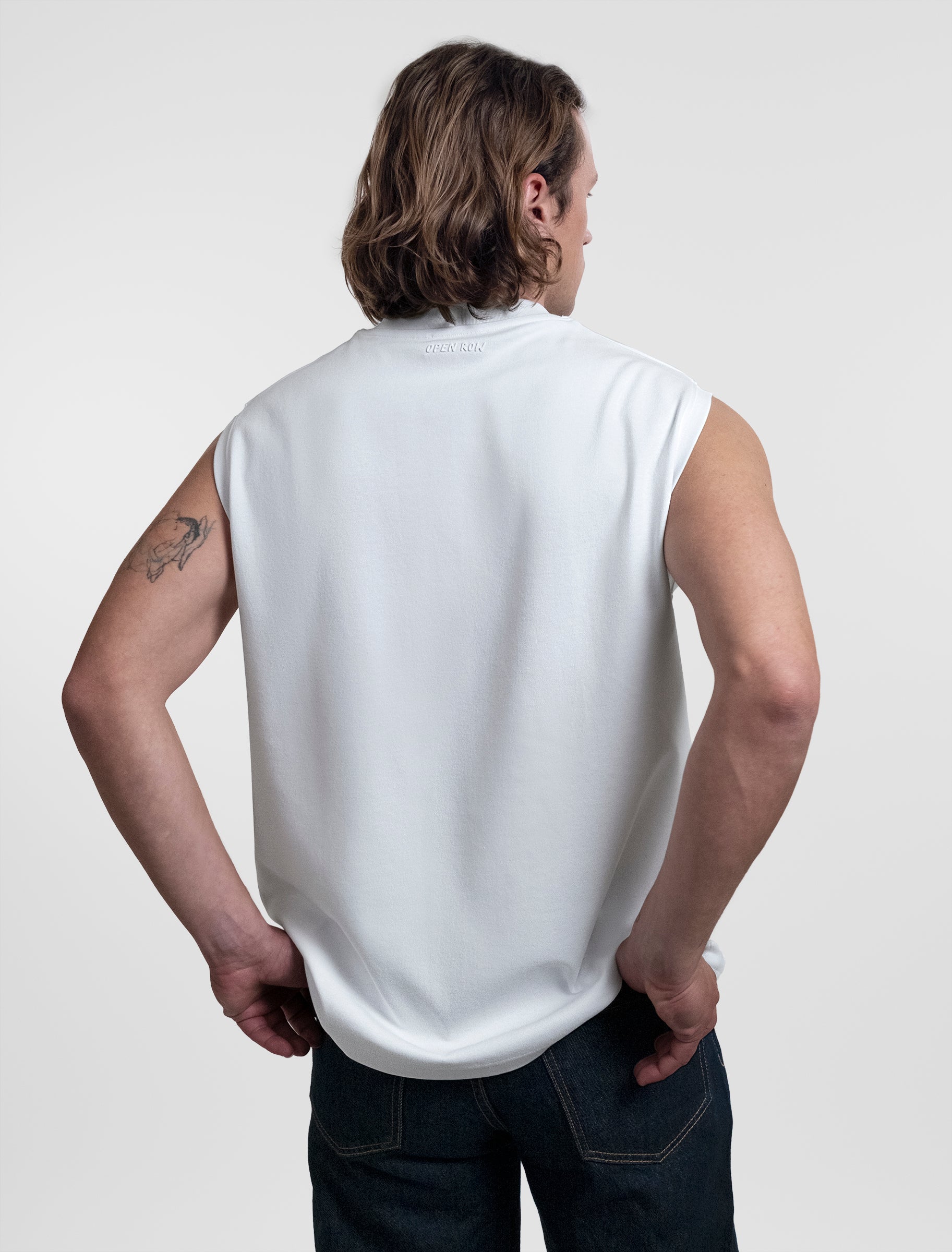 Open Row Men's Tank Tee in white, back view.