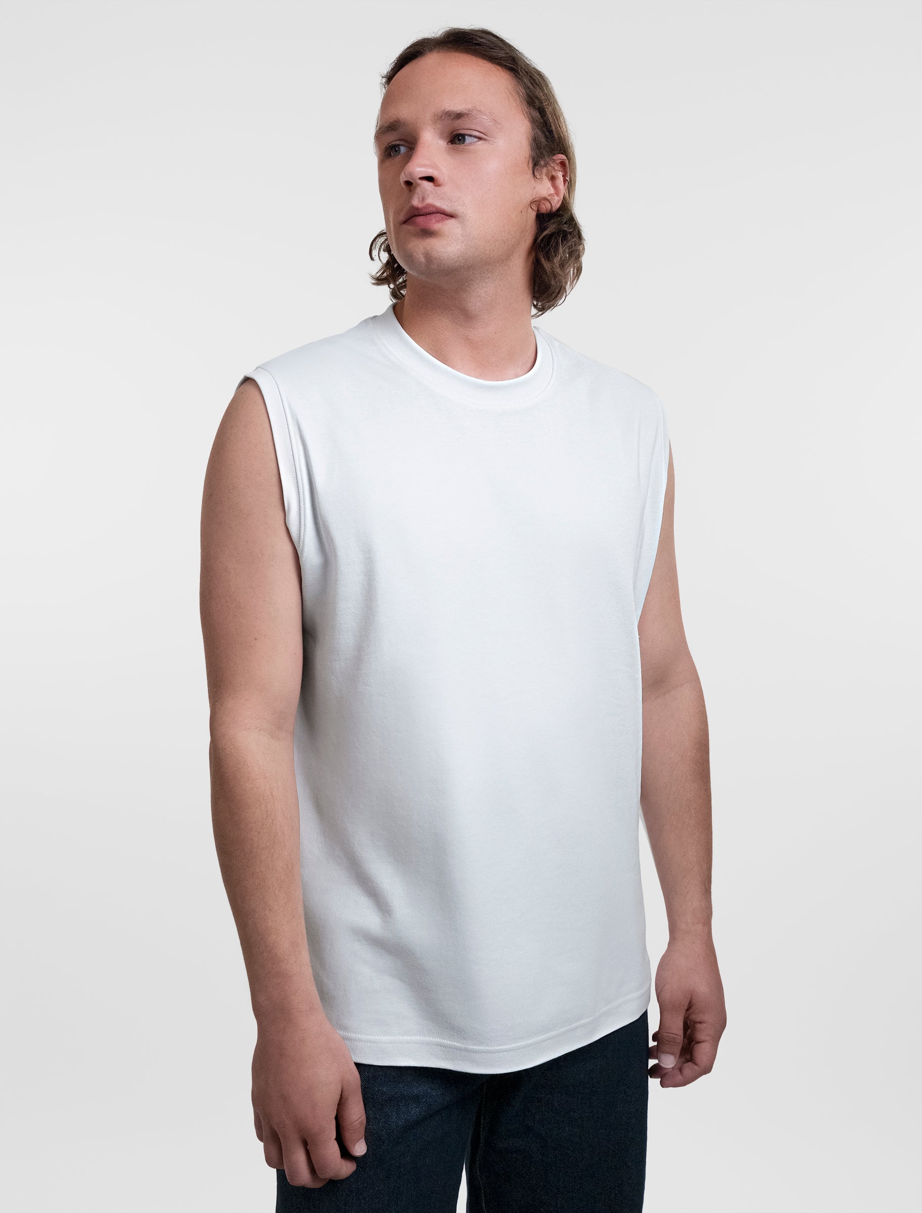 Open Row Men's Tank Tee in white, three-quarter front view.